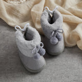 Baby pompom bow booties